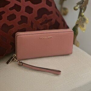 Pretty in Pink Michael Kors Wallet....gently used with Michael Kors gold accents